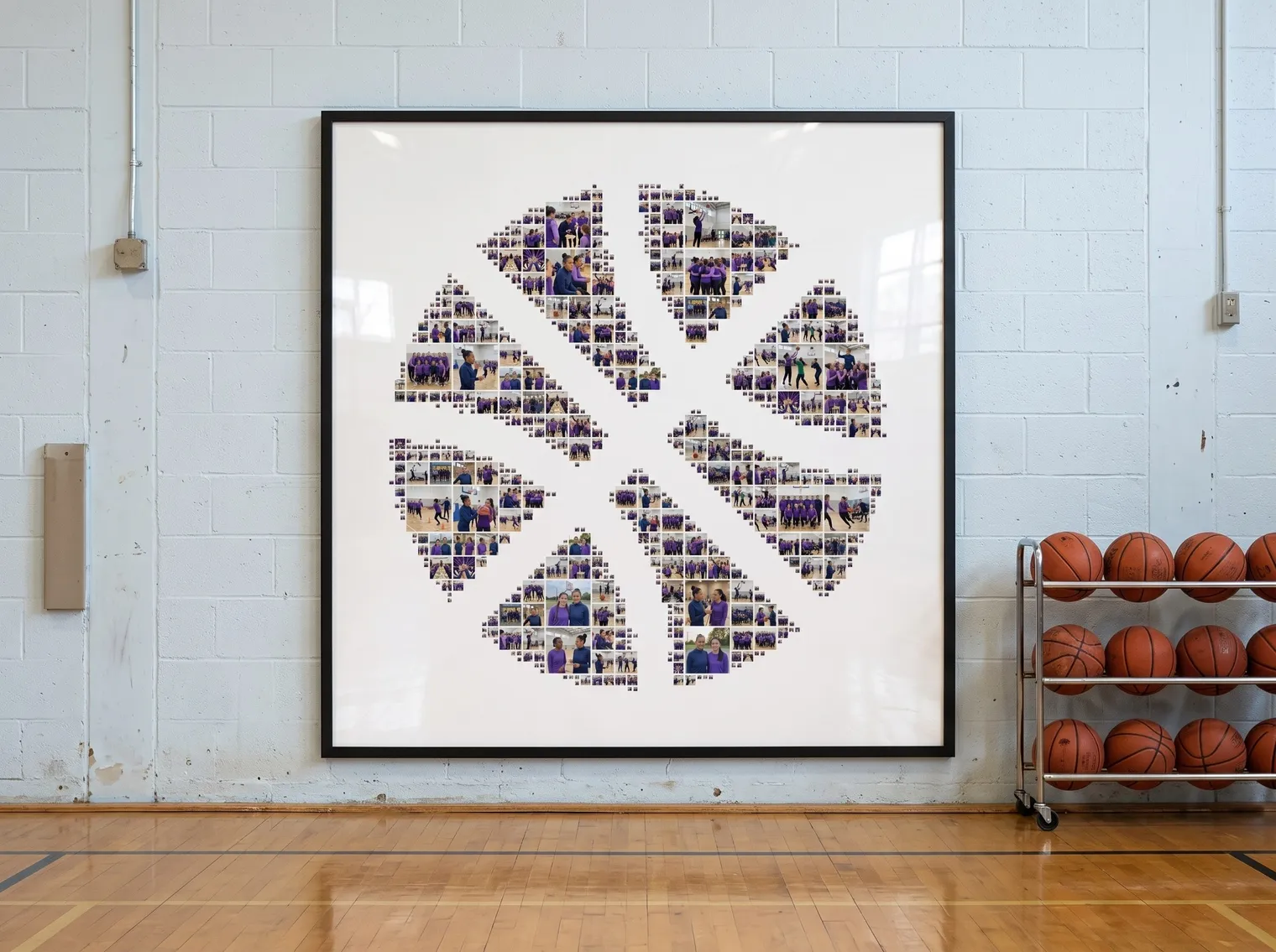 The basketball photo collage in a slim black aluminium frame on a sports-hall wall next to a rack of basketballs