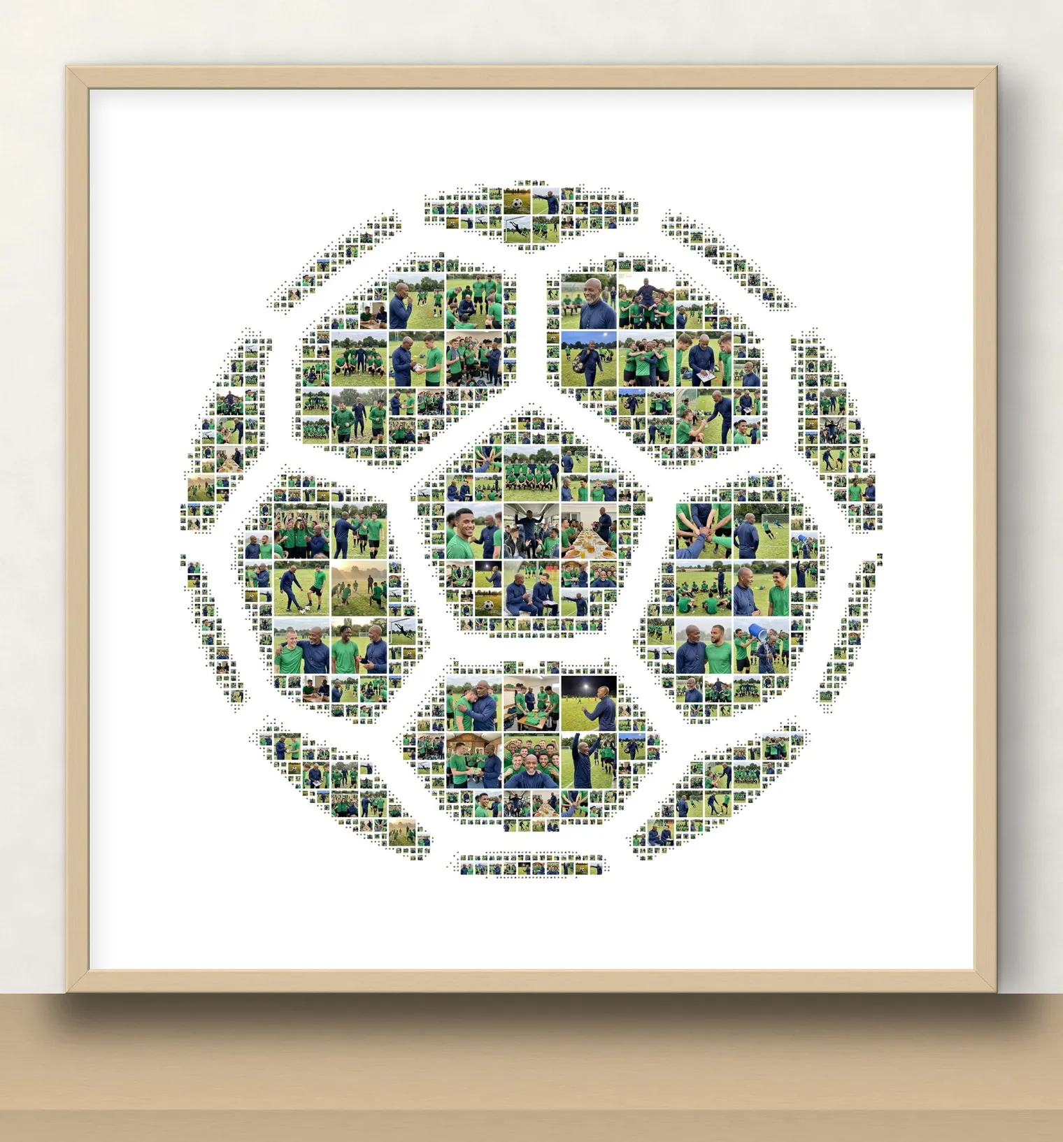 Soccer-ball-shaped photo collage made of photos of an adult amateur football team and their coach, in a thin birch frame standing on a wooden shelf